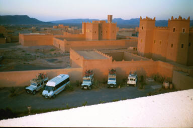 Our minibus and four bike tour Land Rovers at Kasbah Baha