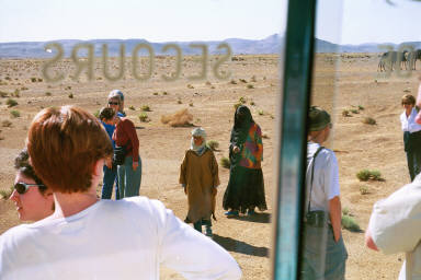 Locals selling fossils and asking for dirhams