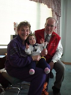 Proud grandparents!  My mother and father and my niece, Genevieve, Christmas 1998