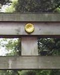 Imperial crest at torii of Meiji shrine