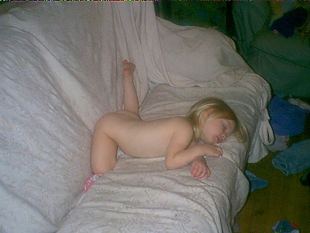 Baby sleeping in a really awkward position