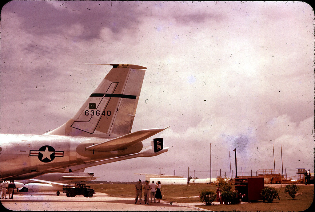 92nd Air Refueling Squadron short-tailed KC-135A 56-3640 at Hickam AFB, Hawaii in 1959. They dragged a B-52C across the Pacific Ocean to here. The 92nd AREFS marked their early KCs with a black band across the tail and the boom ruddervators with JJ plus a number. This one has JJ-16. I have seen JJ-11, JJ-15, JJ-16, JJ-23, JJ-24, JJ-31.