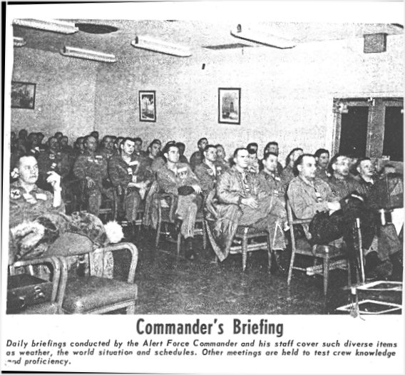 100th AREFS aircrew receiving their morning alert brief. Notice the 100th AREFS patch on the flightsuit of the far left crewmember.