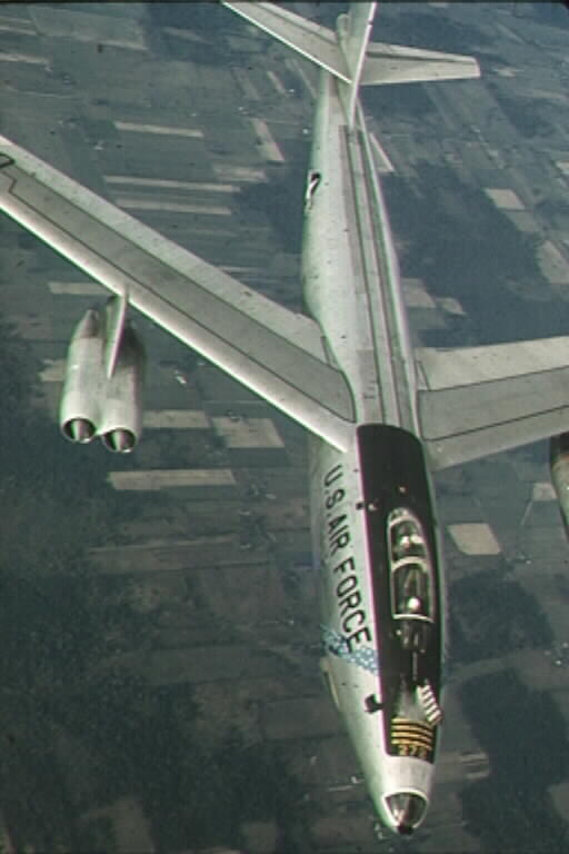 A B-47 splitting off after refueling from a 100th AREFS KC-97.