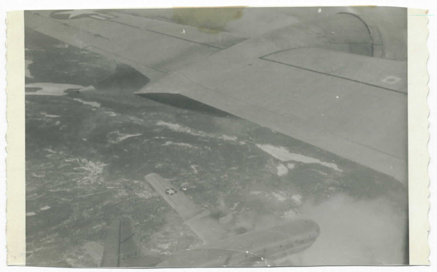 301st AREFS KC-97G in close formation with another 301st KC over Canada in 1957. The diagonal stripe on the tail is dark green.