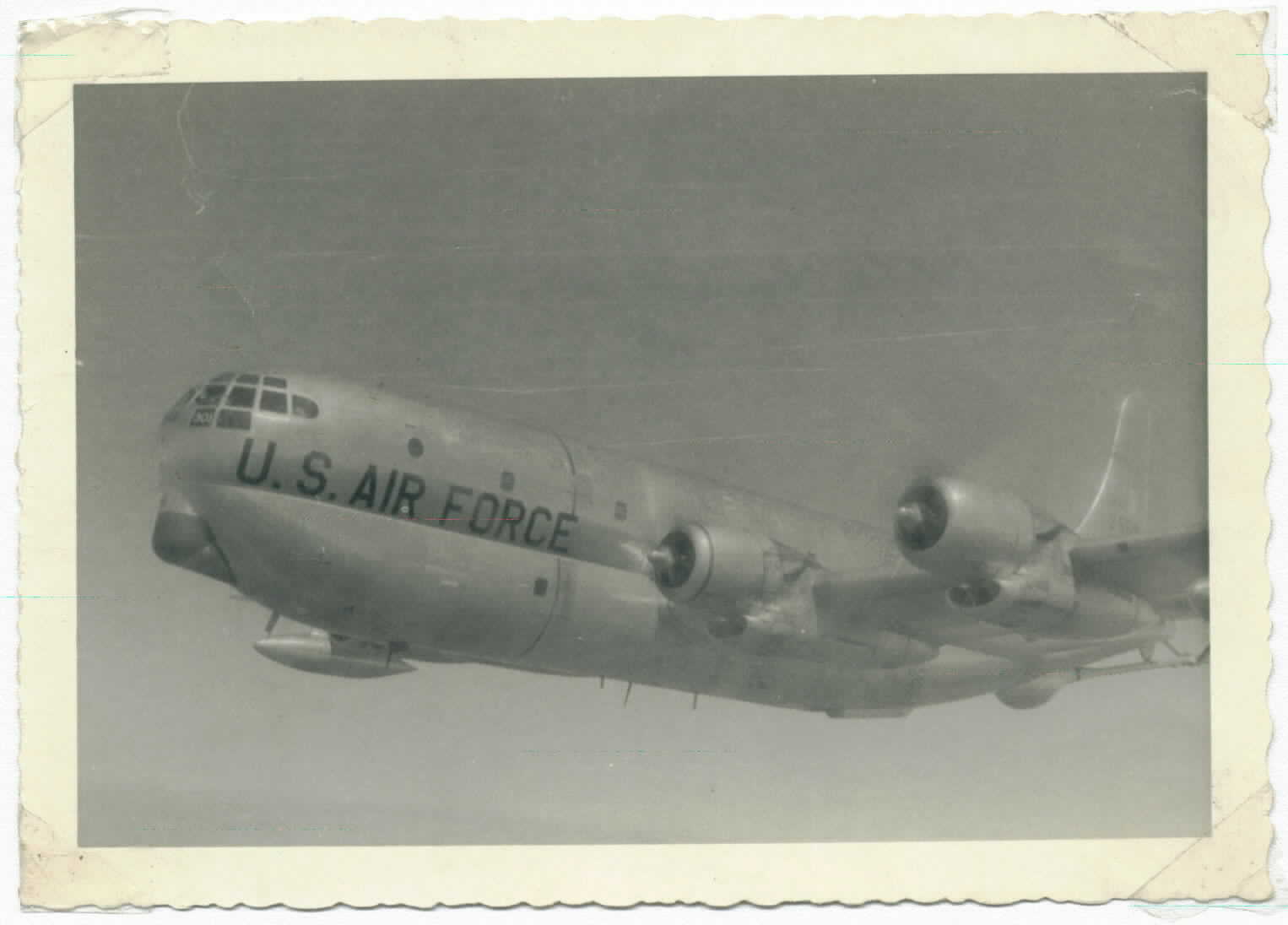 301st AREFS KC-97G in close formation with another 301st KC over Canada in 1957. The diagonal stripe on the tail is dark green.