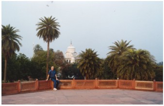 A Moghul&nbsp; masoleum, with a temple in the background.