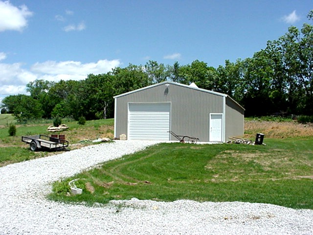 Dad's Barn in May '04 - Just been trying to grow grass all year....