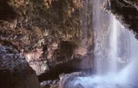 a view from inside of cave