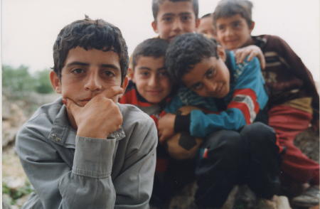 Friendly,  Syrians live in a closed society and b/c of that they are still enchanted by outsiders with cameras.