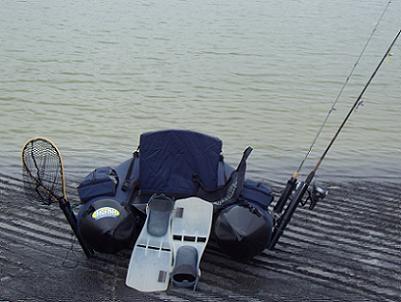 This is my new Fish Cat 4 float tube from Outcast, ready to launch on its maiden voyage on Utah Lake.&nbsp; Note the BFT sticker and custom homemade rod holders.&nbsp; This beauty is VERY comfortable, and I am so glad I got it.
