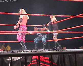 Edge & Christian working D-Von over