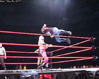 Flying headbutt by D-Von into Edge