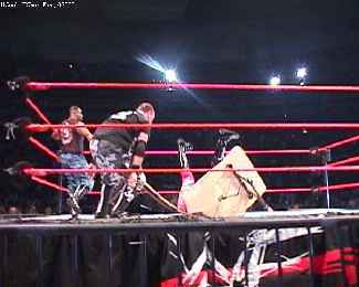 Edge & Christian win, but Edge gets a taste of wood!