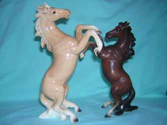 2 rearing horses