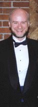Kim in a tux...