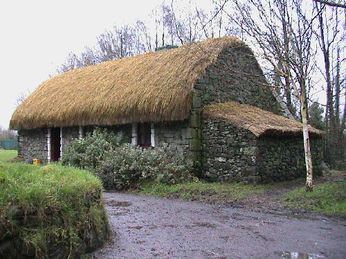most authentic thatched roof house on the trip minus the yellow bucket by the door