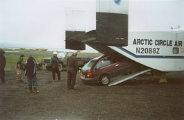 A new car being shipped into Goodnews Village.