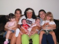 Kim with daughters and grandchildren