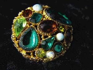 Sphinx "winegums" jewel-encrusted brooch
