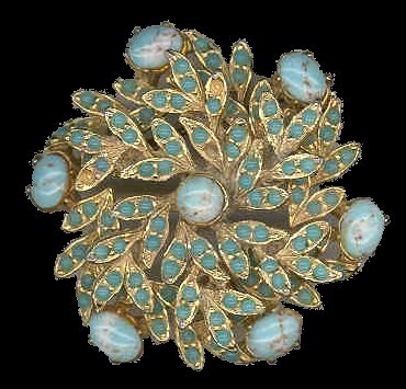 Sphinx Round brooch with turquoise cabouchons