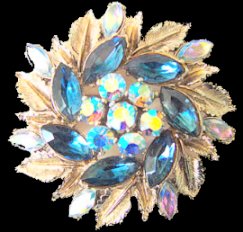 Sphinx round: Goldtone leaves and navettes