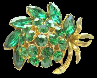 Sphinx curled flower and leaves set in emerald rhinestones