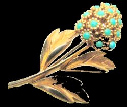 Sphinx goldtone flower stalk with turq cabs flower