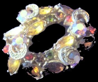 Sphinx Baby oval wreath with 4 Crescents - autumnal golds