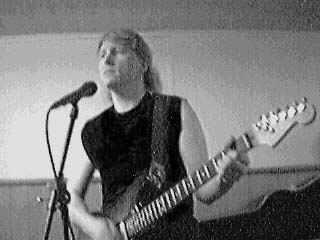 {Me and my Strat, singing self composed songs in my basement}