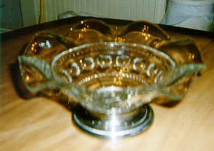 Crimped bowl with silver stand