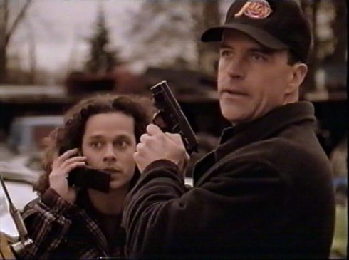 Blair calling for backup on the cellphone 