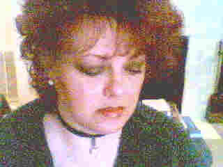 Kitten troubleshooting computer problem online - Thanksgiving 2002 image name:Picture1.jpg