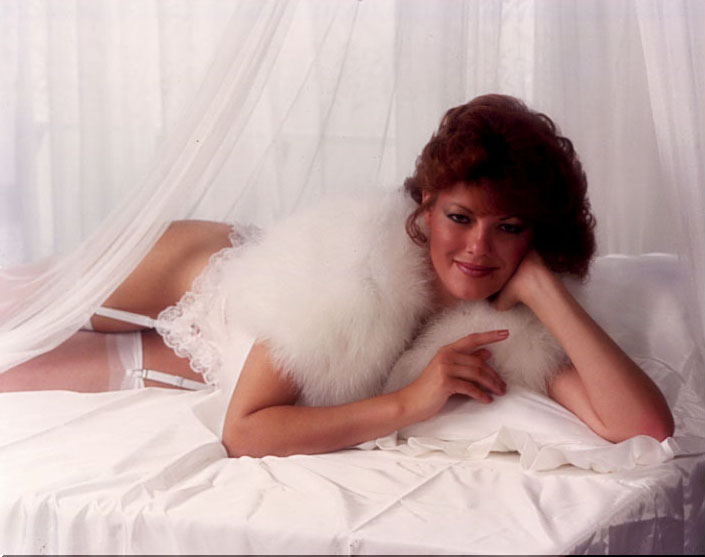 *smirk* Another Kitten 'oldie' from the modeling days. This photo actually hung on a wall in a prominent local lingerie shop in the 1980s. A 'naughty' Kitten? Unfortunately, the photog's airbrush artist didn't do it justice. Oh well! Enjoy!!! image name: whitni.jpg