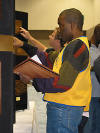 Sec Everald at Convention 2003. Convention pins, T-shirts, hats, and more are found at the Kiwanis Family Store.  