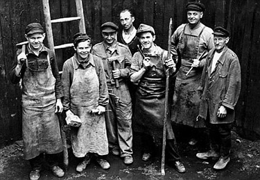 Klaus (younger still) is pictured at far left, his boss Adolf Kruger is second from the right