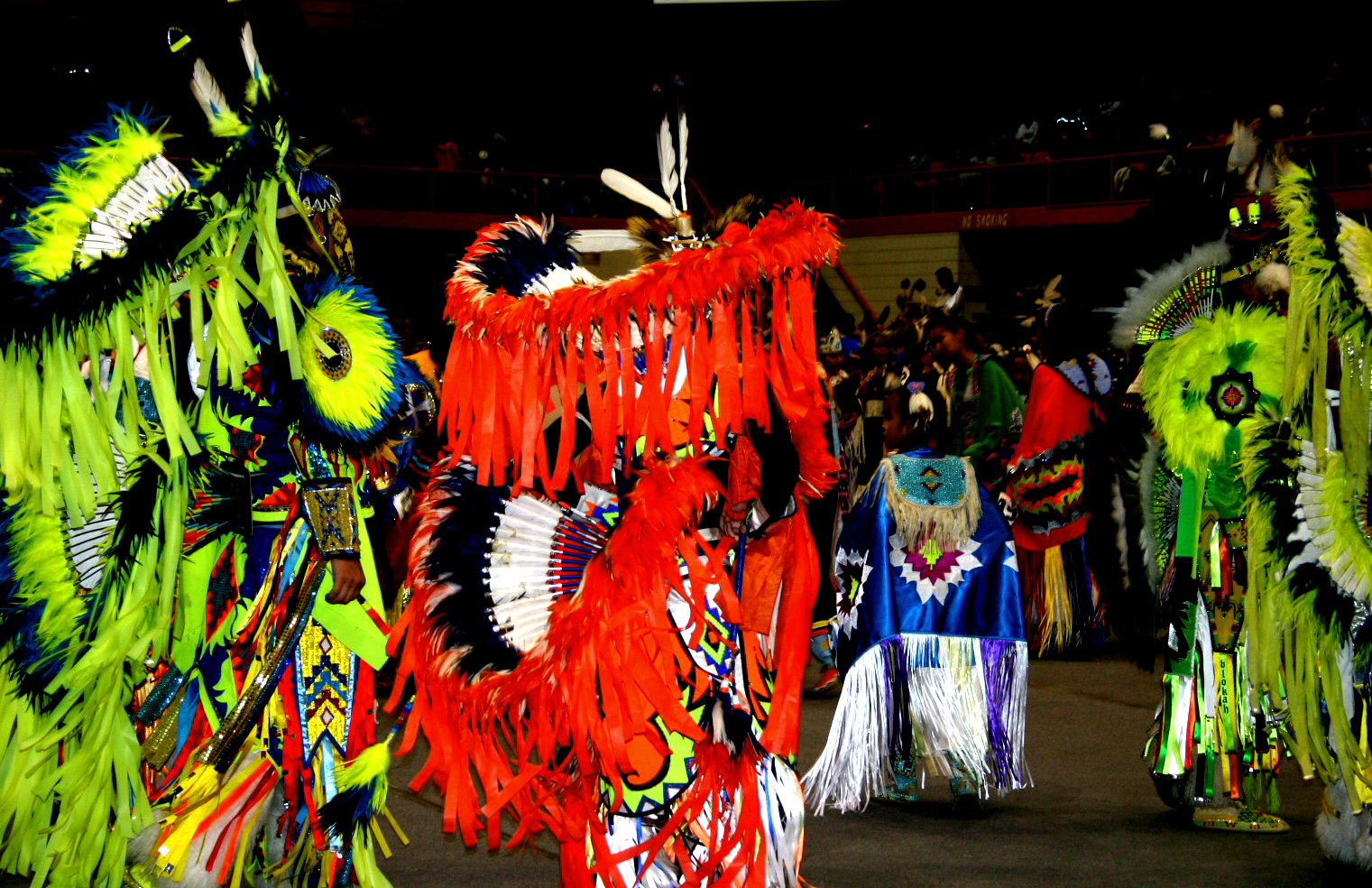 This photo, taken at the annual Black Hills He Sapa Wacipi Pow Wow, caught my attention for its brightly colored neon regalia.