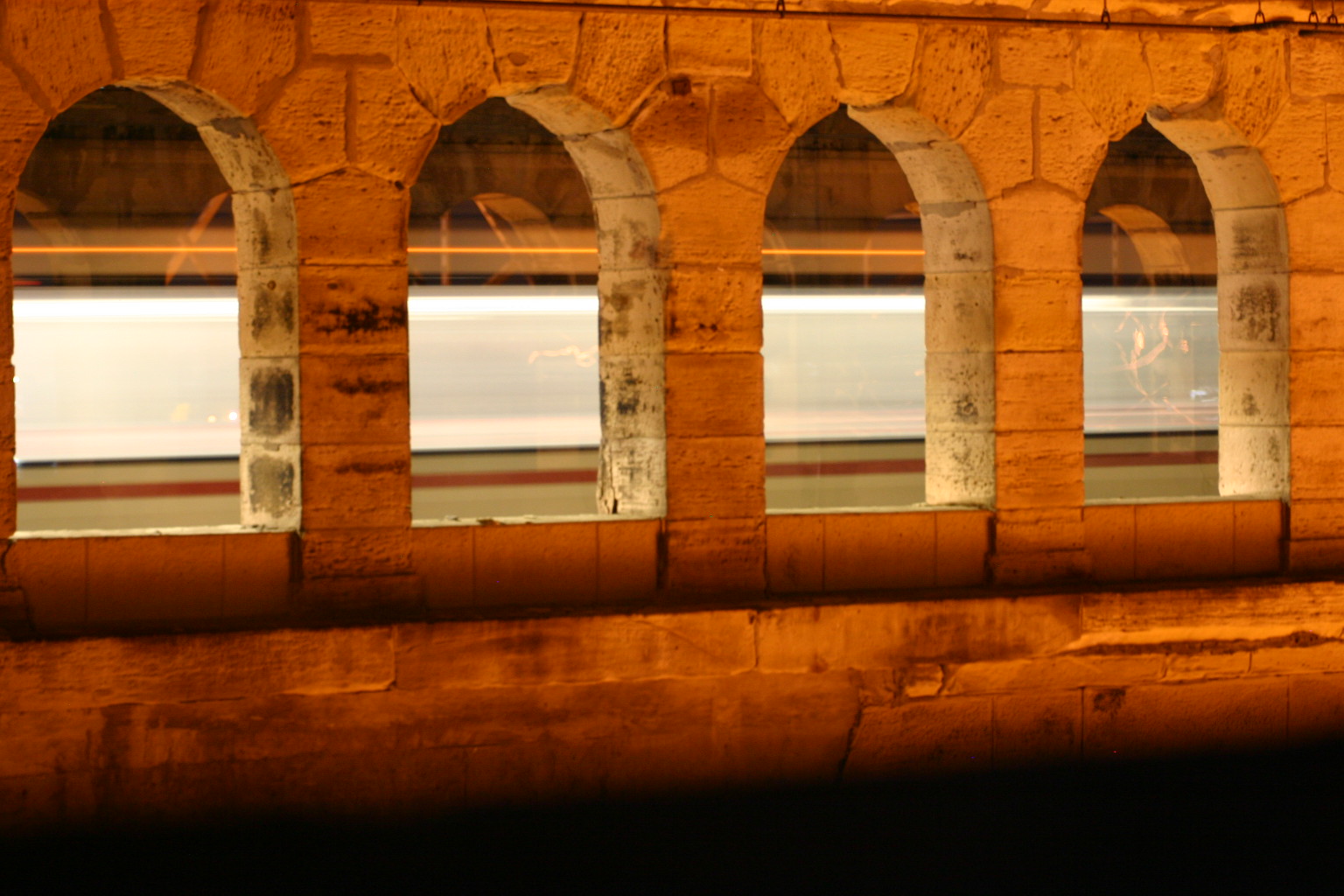 This night photo of the St. Louis Metrolink going through a set of stone arches is one of my favorites from that trip.