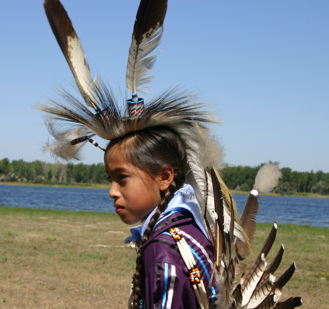 Taken in Yankton, SD, this photo gives a closer view of the traditional head pieces worn by the Lakota warriors.&nbsp; Used with permission.