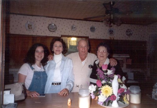 My Grandmother with her Husband, Daughter, and Grandaughter (me!).
