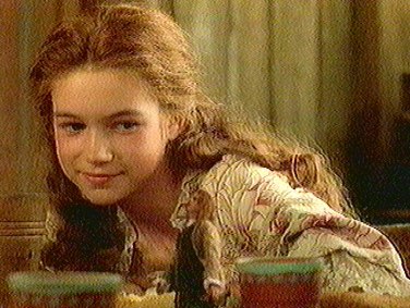 Glum (Kate Maberly) looking at Gulliver.