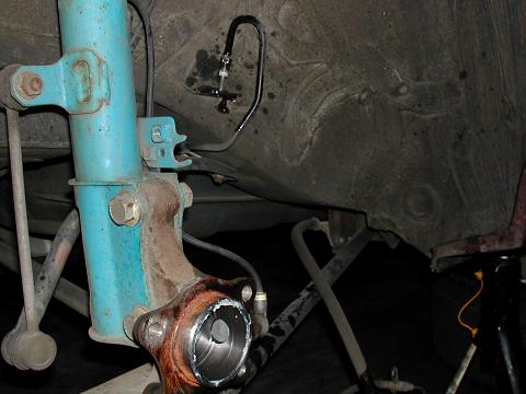 The brakes and the wheel hub removed