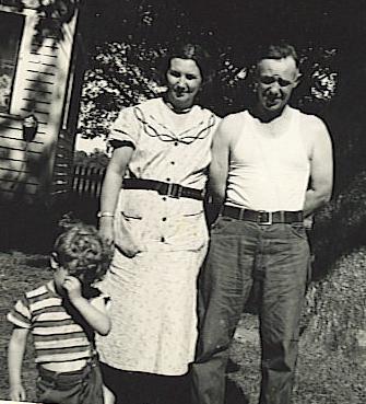 Mom & Dad in 1957 with brother John