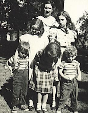Russell with sisters , brother and Mom.