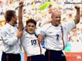 [English soccer team members celebrate after a goal] 