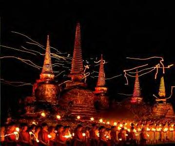 [Disciples of Buddha pay homage near religious sites]