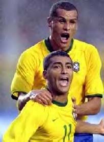 [Romario & Rivaldo enjoy their victory in the soccer field]