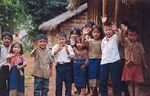 Hmong children waving a friendly good-bye...