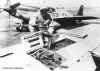 http://www.geocities.com/kp6der/pictures/p-51_loading_ammo.jpg (37733 bytes)