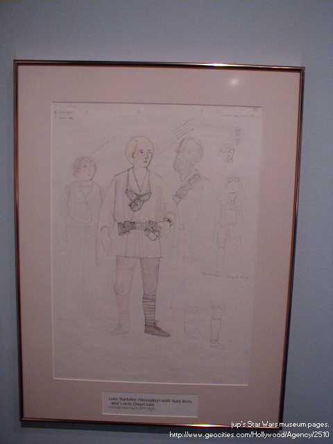 A young Luke Skywalker with Aunt Beru and Uncle Owen.